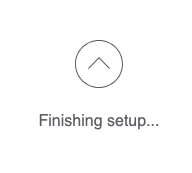 Up arrow icon with "Finishing setup..." text below
